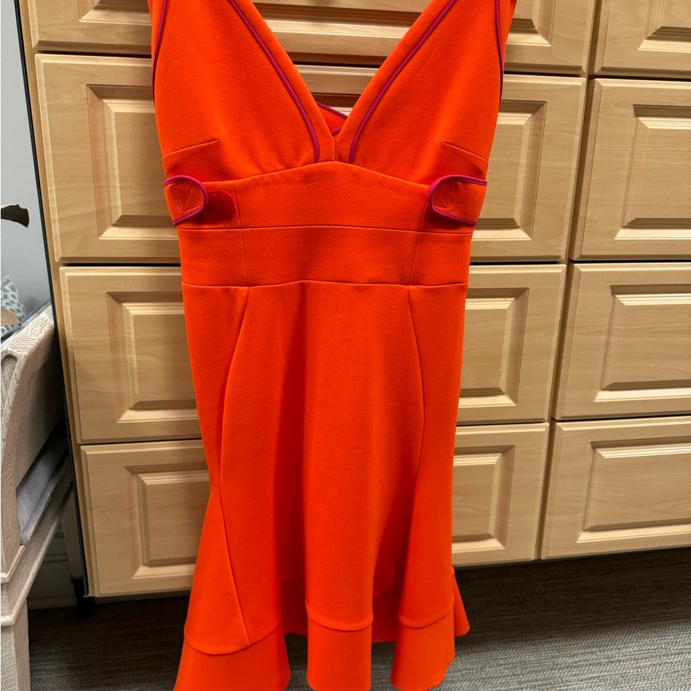 Orange and purple piped dress from Italy